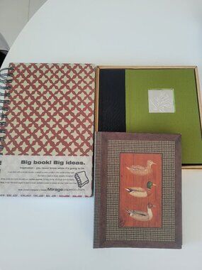 Three brand new notebooks journals